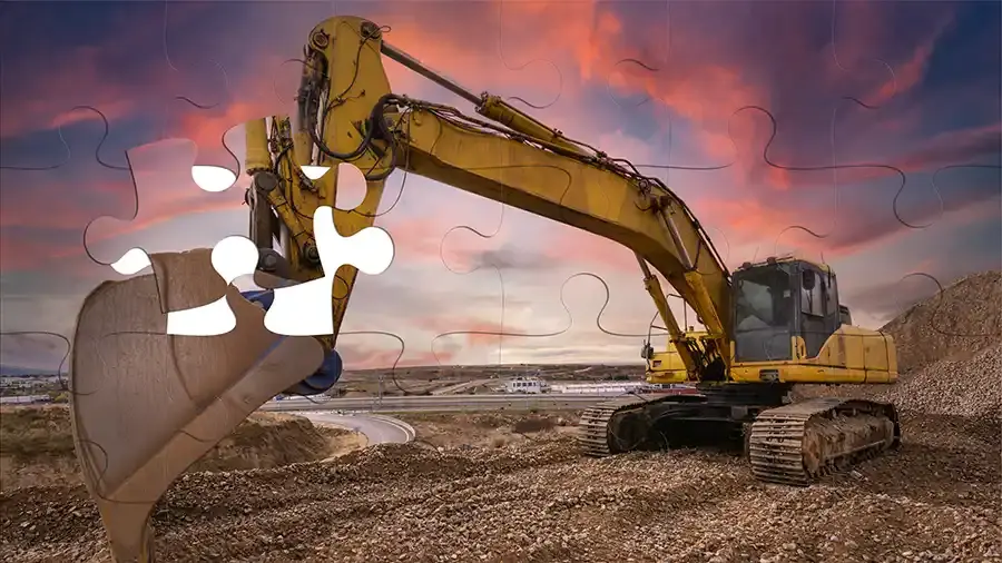 excavator digging on worksite with colourful background